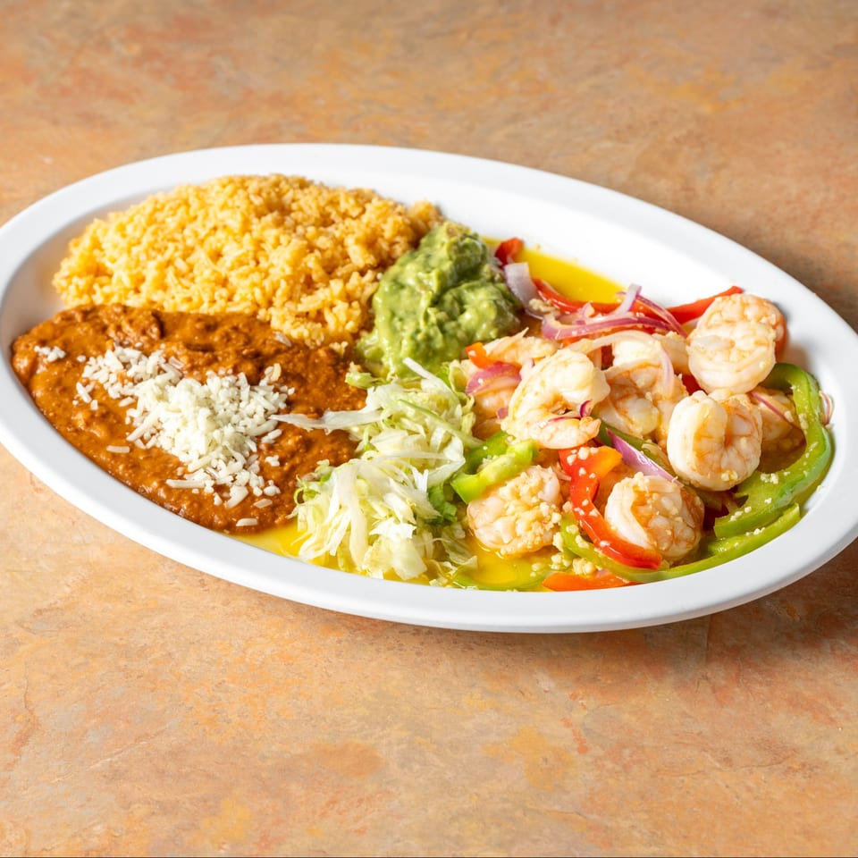 Individual shrimp plate with rice and beans.