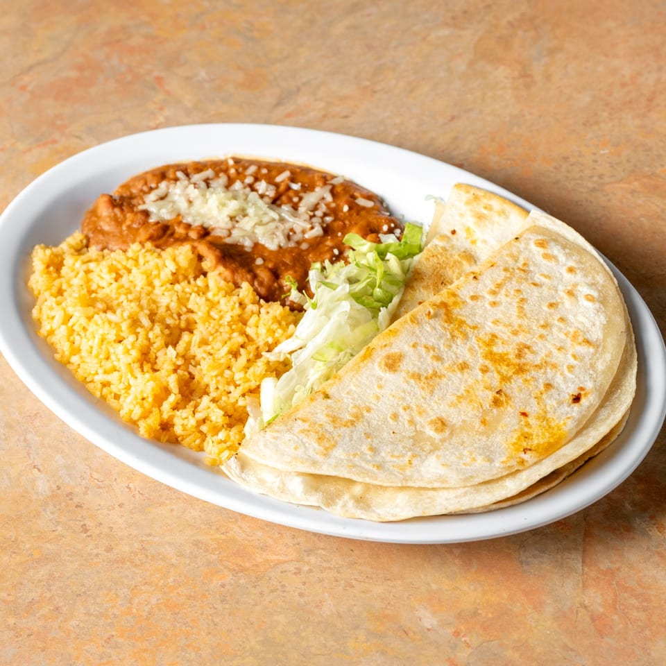 Quesadilla plate with rice and beans.