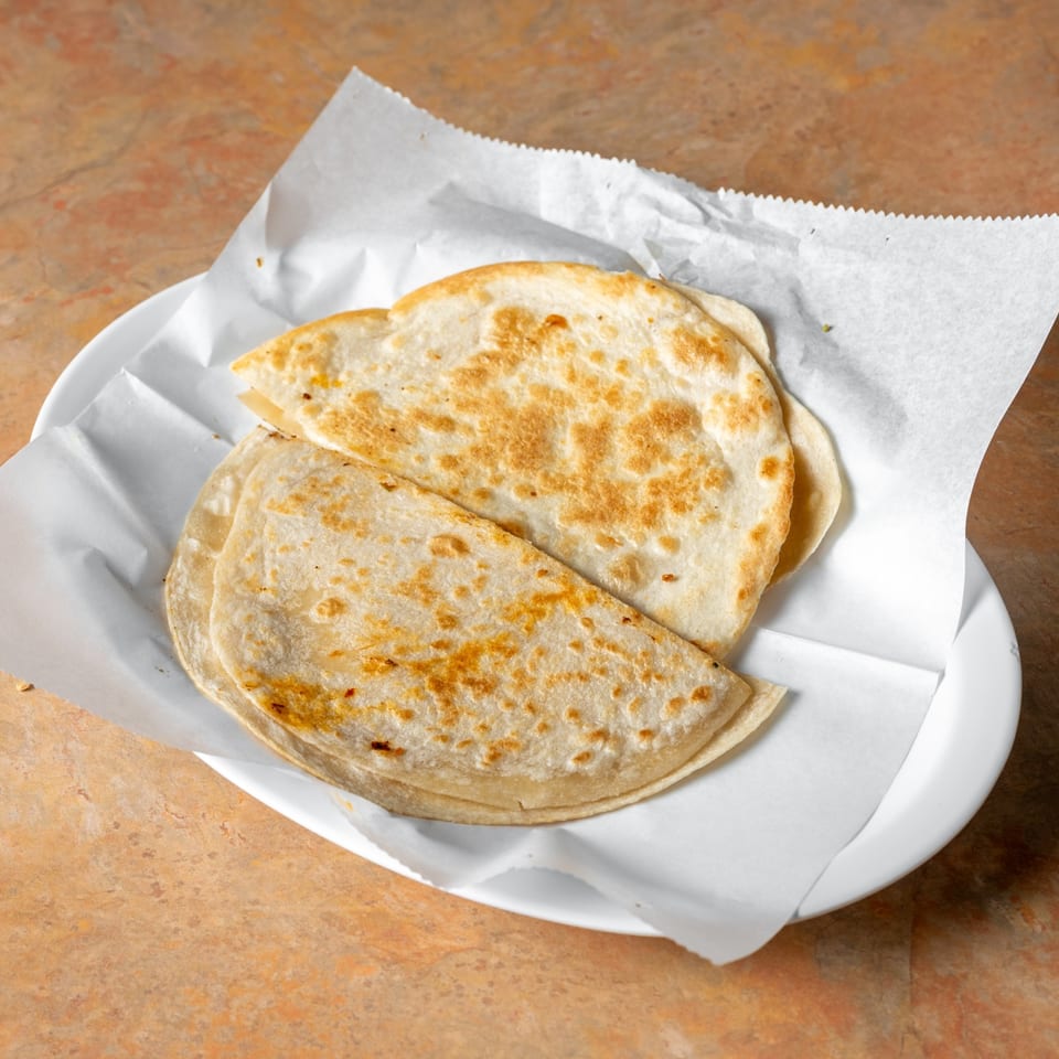 Toasted quesadilla wedges.